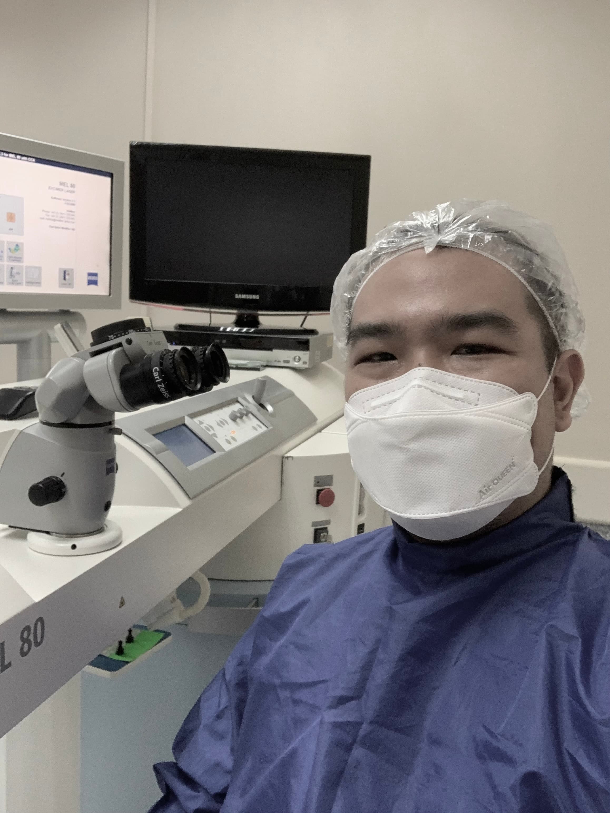 Dr. Andrei Martin performing an eye examination